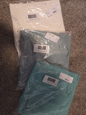 Maurices V-Neck Knit Top Trio in White, Sage, and Teal